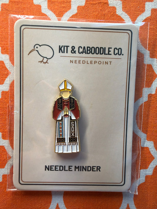 Cardinal saint needle minder in liturgical robes