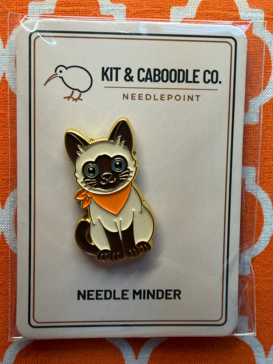 Siamese cat needle minder with orange bandana