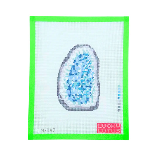 Digital art of a blue and white textured object with a green border and 'Lucky Lotus' branding.