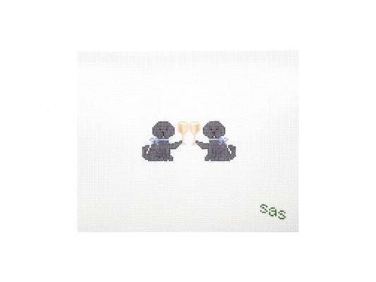 Two small dog figures with a 'Sas' text on a white background