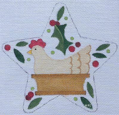 Star-shaped needlepoint canvas with a hen, basket, holly, and red berries
