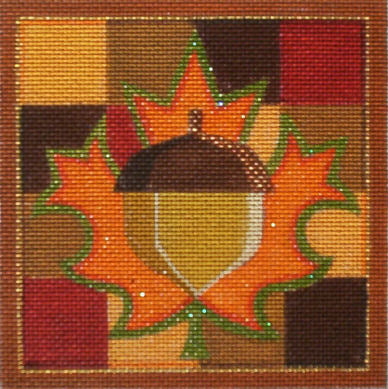 Decorative needlepoint with acorn design on a checkered background