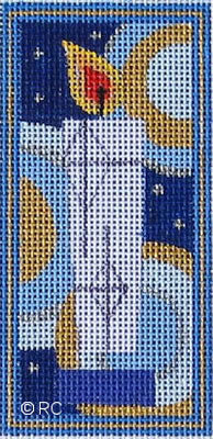 A white candle with a red and yellow flame on a blue needlepoint canvas