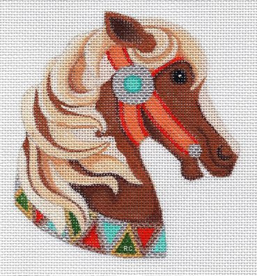 Decorative horse head with a headdress on a white background
