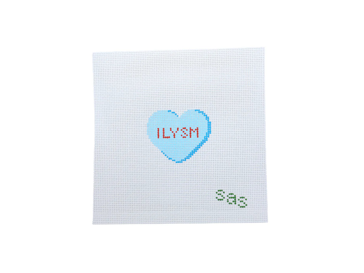 Cross-stitched heart with 'ILYSM' text on a white background