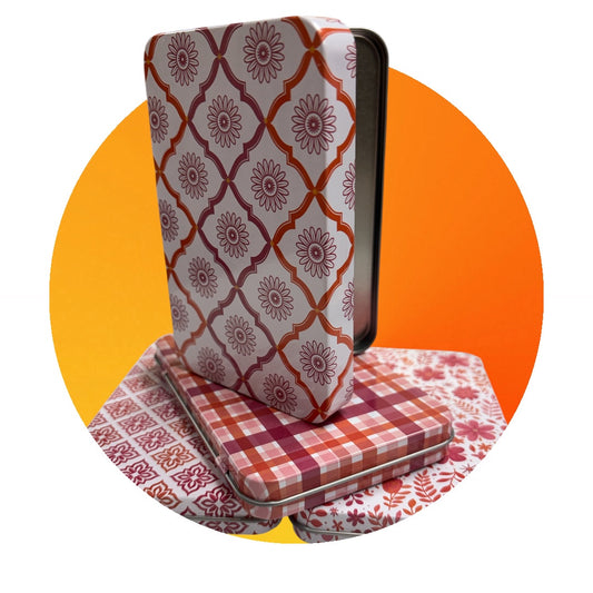 Foldable seat with patterned design on an orange background