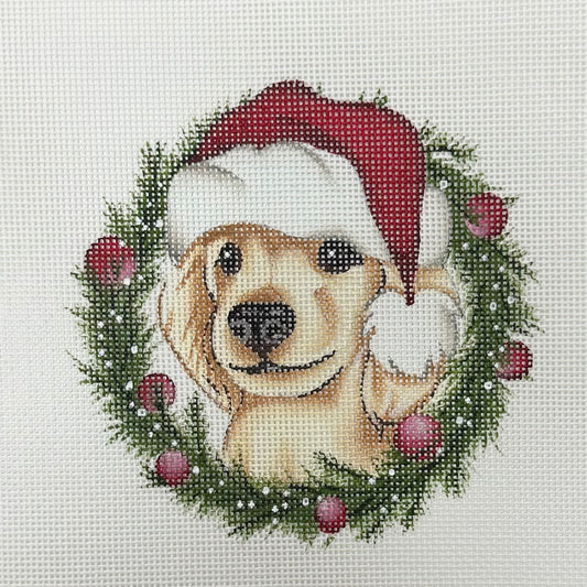 Cross-stitched dog wearing a Santa hat and wreath with berries on a white background