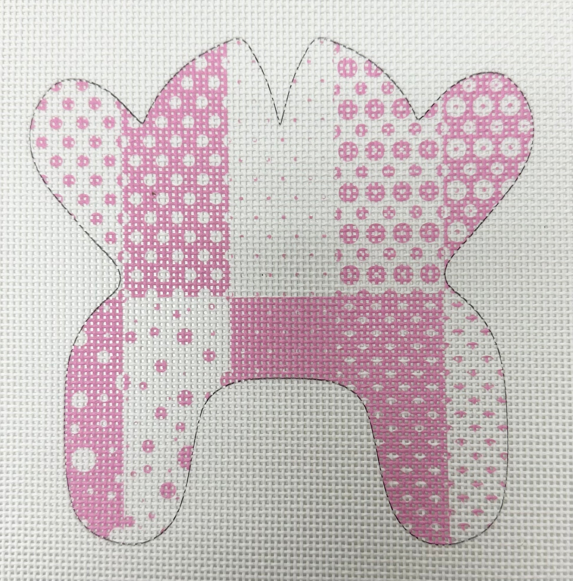 Pink patterned bunny shape on a white background