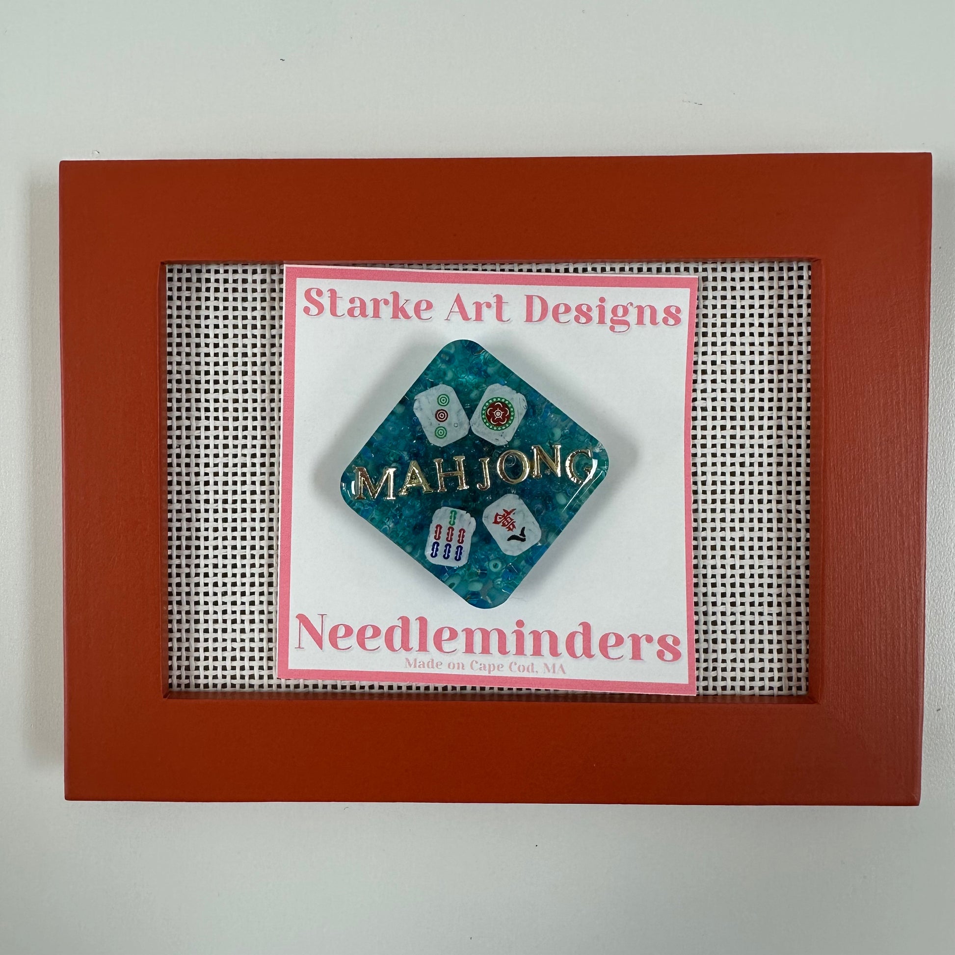Starke Art Designs Mahjong Needle minder in a red frame