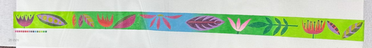 Decorative ribbon with colorful leaf pattern on a green background
