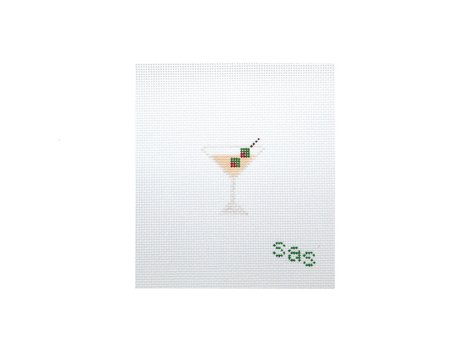 Cross-stitched design of a cocktail with a straw on a white background