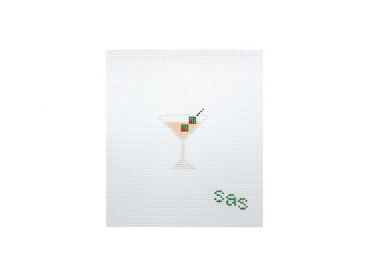 Cross-stitched design of a cocktail with a straw on a white background
