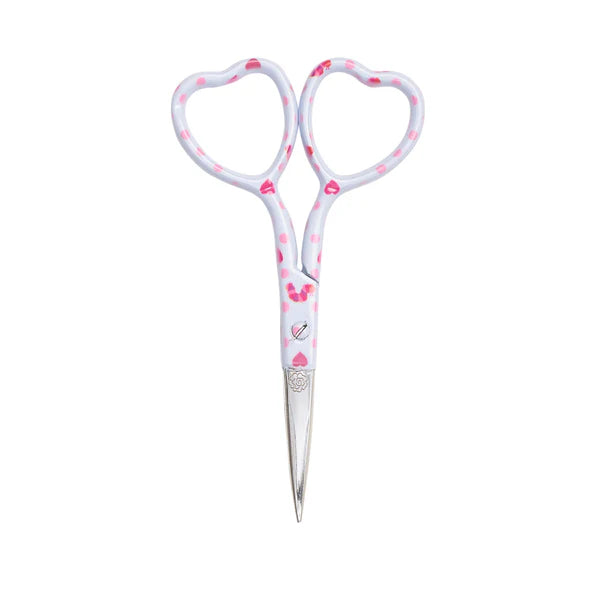 Heart-shaped scissors with pink heart designs on a white background