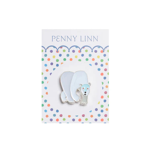 Polar bear pin on a colorful polka dot card with 'Penny Linn' branding