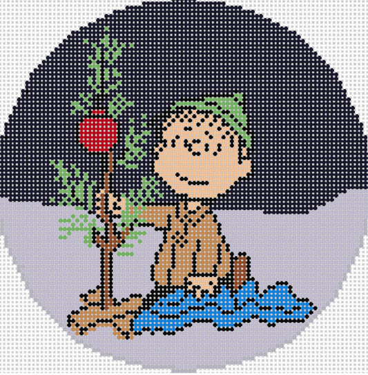 Linus Kneeling Wrapping Blanket Around Tree
