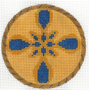 Circular wooden coaster with blue floral pattern on a white background