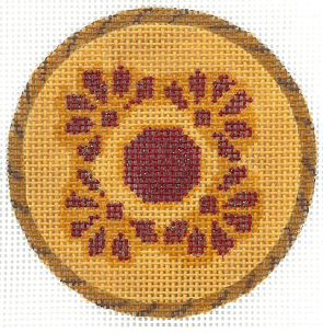 Round wooden coaster with a beaded design in the center