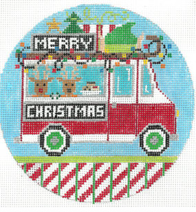 Circular Christmas-themed design with a red truck and reindeer on a blue background