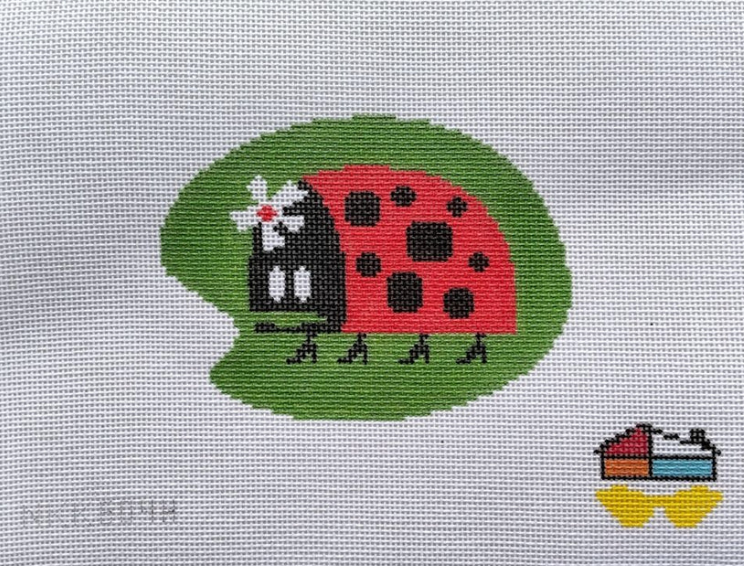 Ladybug needlepoint on green leaf