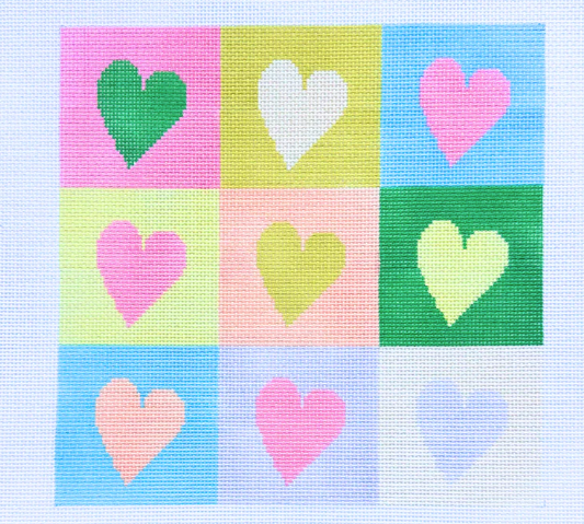 Grid of colorful heart shapes on a light blue background