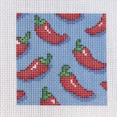 Cross-stitched pattern of red chili peppers on a blue background