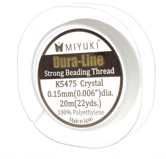 MIYUKI Dura-Line strong beading thread spool on a white background