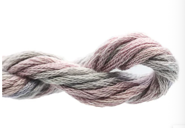 Multicolored skein of yarn on a white background