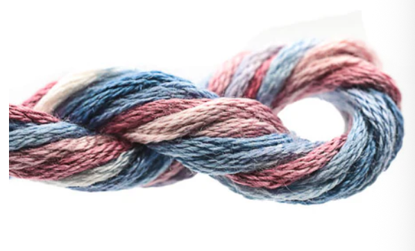 Braided yarn with blue and pink colors on a white background