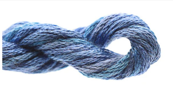 Blue skein of yarn on a white background