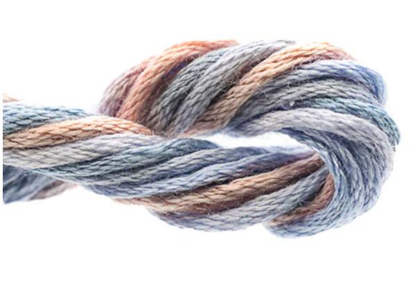 Multicolored yarn skein on a white background