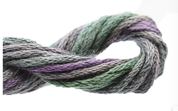 Multicolored yarn skein on a white background