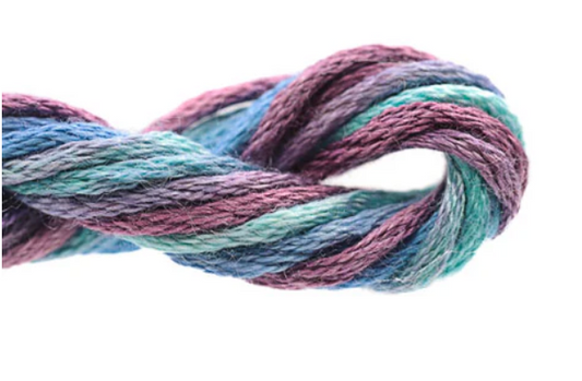 Multicolored yarn skein on a white background