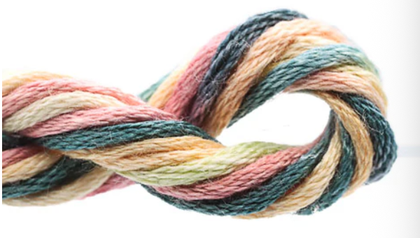 Multicolored yarn skein on a white background