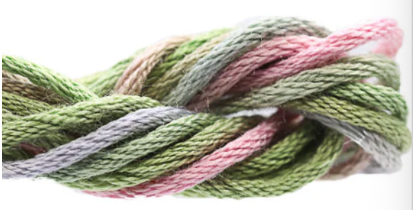 Ball of multicolored yarn on a white background