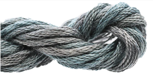 Coiled skein of gray yarn on a white background