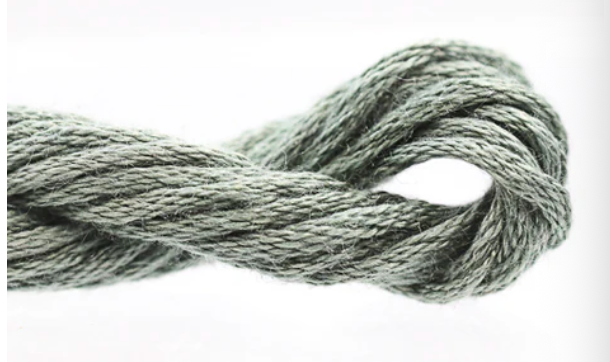 Gray skein of yarn on a white background