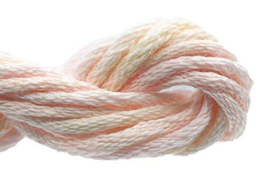 Pastel-colored yarn skein on a white background
