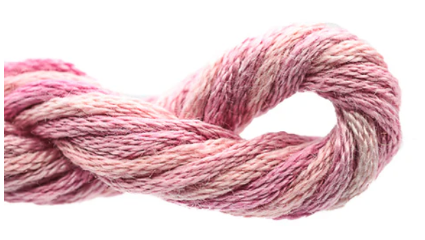 Pink skein of yarn on a white background