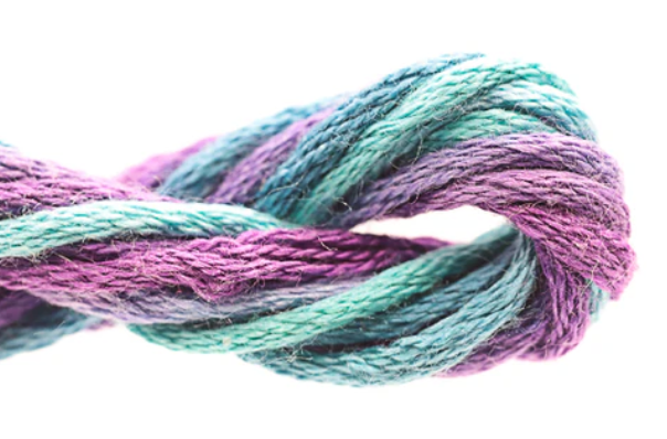 Close-up of multicolored yarn on a white background