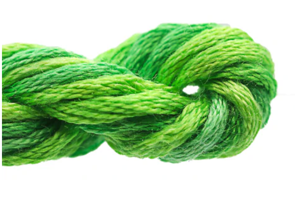 Green skein of yarn on a white background