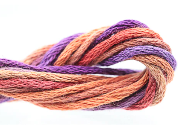 Multicolored yarn skein on a white background