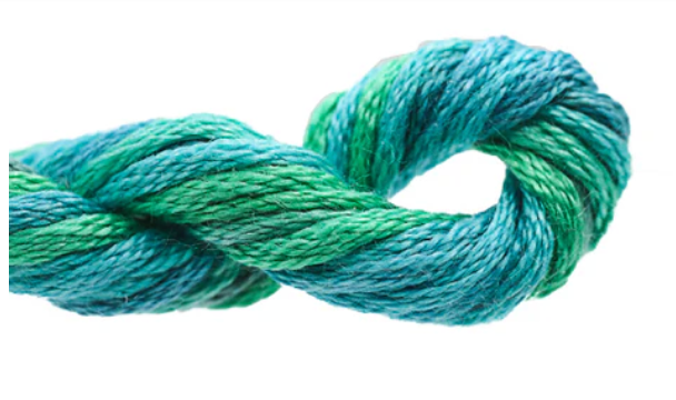 Blue and green skein of yarn on a white background