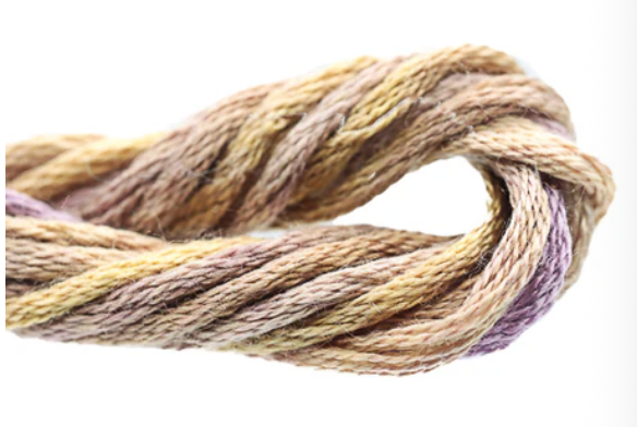 Coiled multicolored yarn on a white background