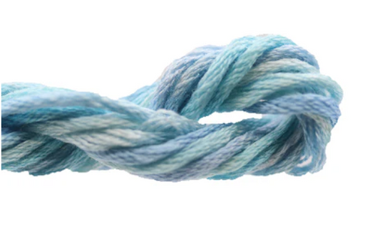 Blue and white skein of yarn on a white background