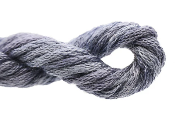 Close-up of gray yarn on a white background