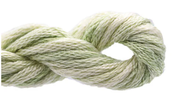 Light green skein of yarn on a white background