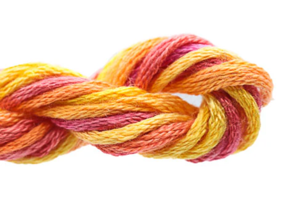 Multicolored yarn skein tied in a knot on a white background