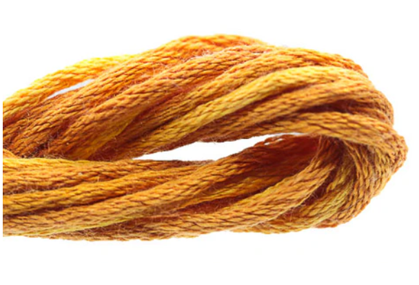 Close-up of a skein of orange embroidery floss on a white background
