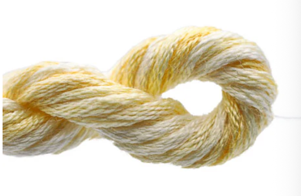 Yellow and white skein of yarn on a white background