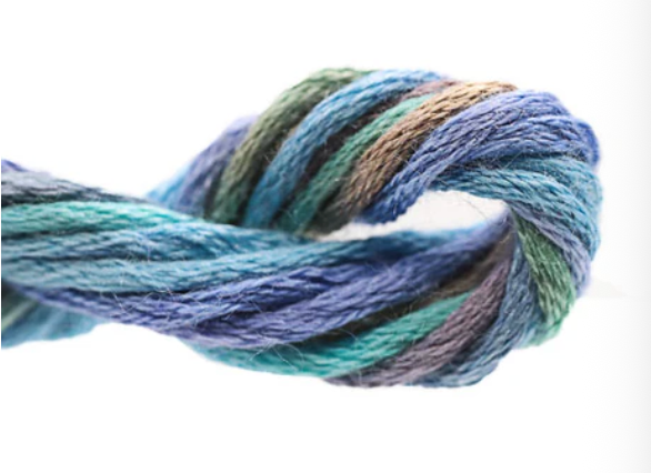 Multicolored yarn skein on a white background
